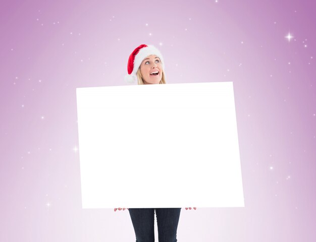 Premium Photo Festive Blonde Showing Poster On Vignette Background