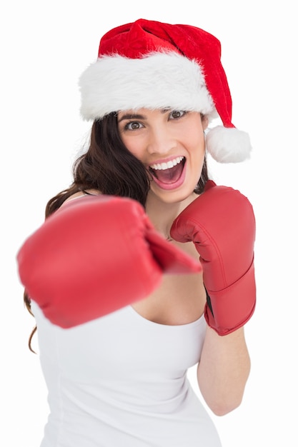 Premium Photo Festive Brunette In Boxing Gloves Punching