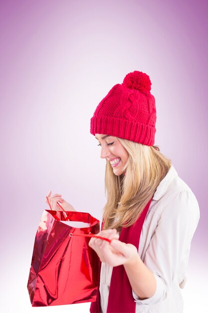 Premium Photo Happy Blonde Opening Gift Bag