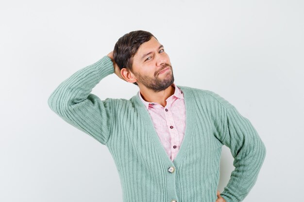 Premium Photo Mature Man In Shirt Cardigan With Hand Behind Head