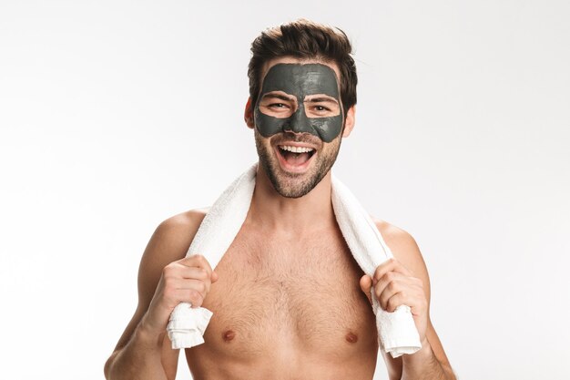 Premium Photo Portrait Of Happy Half Naked Man With Cosmetic Clay