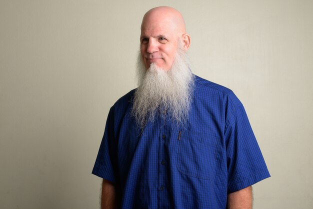 Premium Photo Portrait Of Mature Bald Man With Long Gray Beard