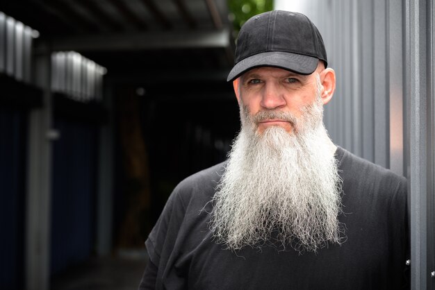 Premium Photo Portrait Of Mature Handsome Bearded Hipster Man In The City