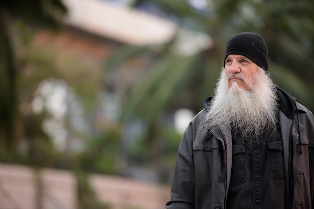 Premium Photo Portrait Of Mature Handsome Bearded Hipster Man Thinking