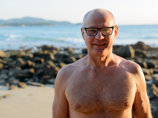 Premium Photo Portrait Of Mature Handsome Tourist Man Shirtless