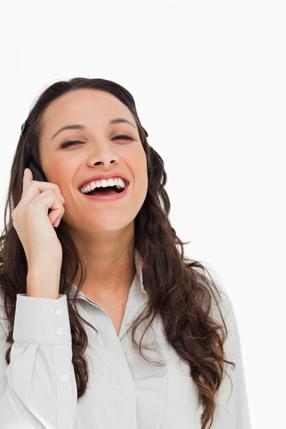 Premium Photo Portrait Of A Pretty Brunette Laughing While Phoning