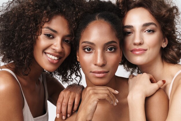 Premium Photo Portrait Of Three Brunette Multiracial Women Standing