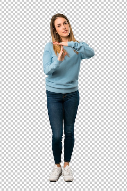 Premium PSD Blonde Woman With Blue Shirt Making Stop Gesture With Her