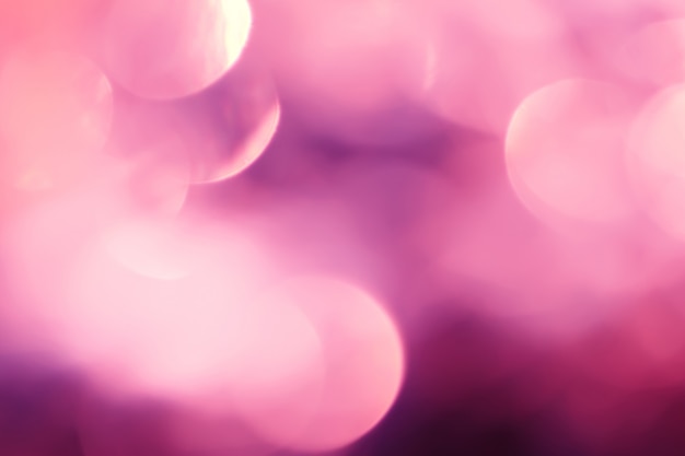 Abstrakcjonistyczny tło z bokeh defocused światłami i cieniem. wielokolorowy bokeh. rocznika styl. disco światła. Premium Zdjęcia