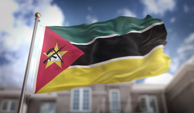 bandera-de-mozambique-representacion-3d-sobre-el-fondo-del-edificio-de-cielo-azul_1379-1383.jpg