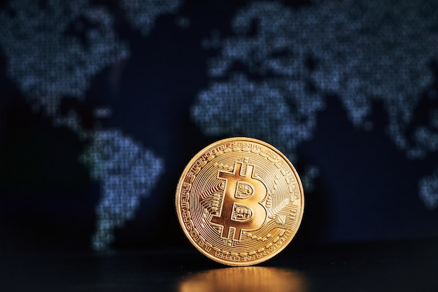 Bitcoin en la superficie del mapa mundial | Foto Premium