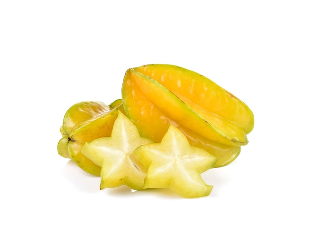 Carambola De Fruta De Estrella En La Pared Blanca | Foto Premium