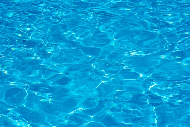 Fondo De Agua En Una Piscina Azul Superficie Del Agua Con Reflejo Del