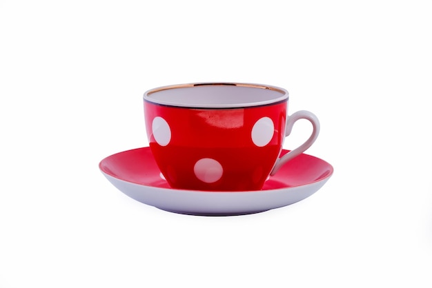 Taza De Cer Mica Roja Con Lunares Blancos En Platillo Aislado Sobre