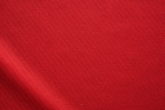 Textura de camiseta de fútbol de tela de ropa deportiva roja cerrar ...