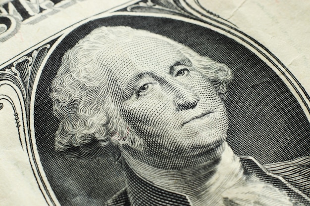 Tiro de primer plano de alto ángulo de un billete de un dólar Foto gratis