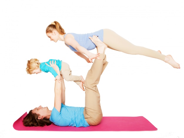 Madre Padre E Figlio Che Fanno Yoga Foto Premium