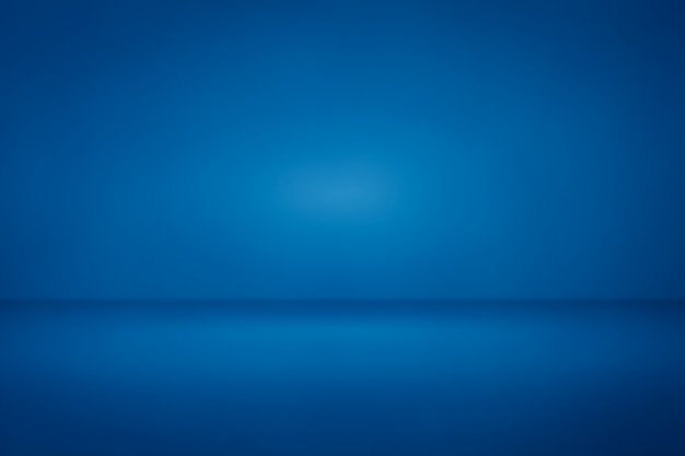 Priorità bassa chiara di pendenza della luce dello studio della stanza blu per il contesto Foto Premium