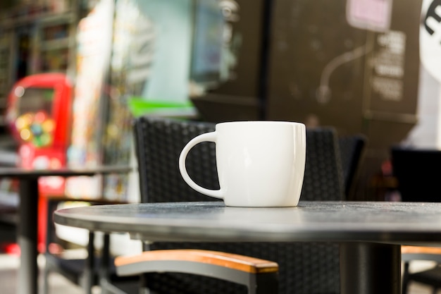 Tazza Di Caffe Con Sfondo Sfocato Foto Gratis