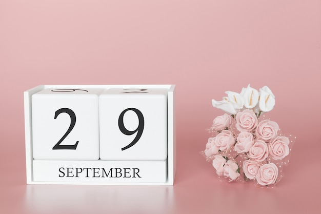 29 de setembro dia 29 do mês. calendar o cubo no fundo cor-de-rosa moderno, no conceito do negócio e em um evento importante. Foto Premium