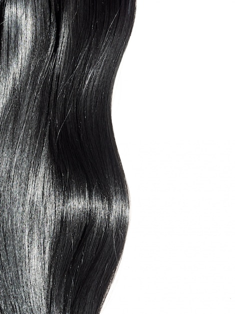 Fundo de cabelo preto reto brilhante. cabelo moreno liso bonito | Foto  Premium