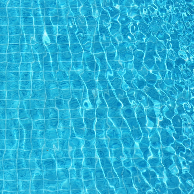 Fundo ondulado azul da água na piscina Foto gratuita Fundo ondulado azul da água na piscina Foto gratuita