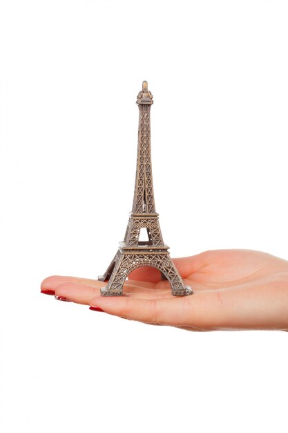 Featured image of post Foto Segurando A Torre Eiffel : Woman walking to the eiffel tower with snow.