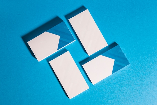 Download Mockup de papelaria com quatro pilhas de cartão de visita ...