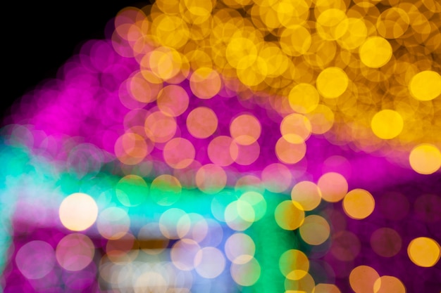 Resumo de bokeh colorido luz de fundo, conceito de escuridão Foto Premium