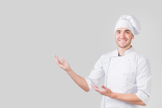 Retrato, de, cozinheiro chefe, apresentando, copyspace Foto gratuita