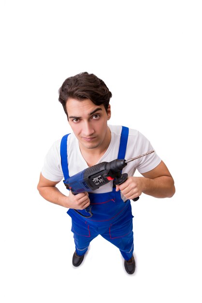 Técnico engraçado com broca isolado no branco Foto Premium