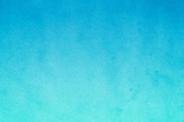 Tinta aquarela gradiente azul em papel velho com resumo de textura suja de manchas de grãos para plano de fundo Foto Premium