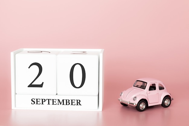 20. september. tag 20 des monats. kalenderwürfel mit auto Premium Fotos