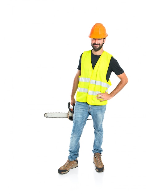 Arbeiter mit kettensäge auf weißem hintergrund Kostenlose Fotos