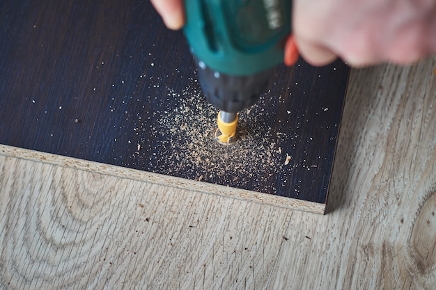 Bohrer sind bohrbretter, holzverarbeitung Premium Fotos