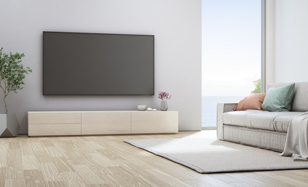 Fernsehen auf weißer wand nahe sofa im ferienheim- oder feiertagslandhaus. hotel interior 3d illustrati Premium Fotos