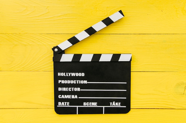 Flache lage der filmklappe für kinokonzept Kostenlose Fotos