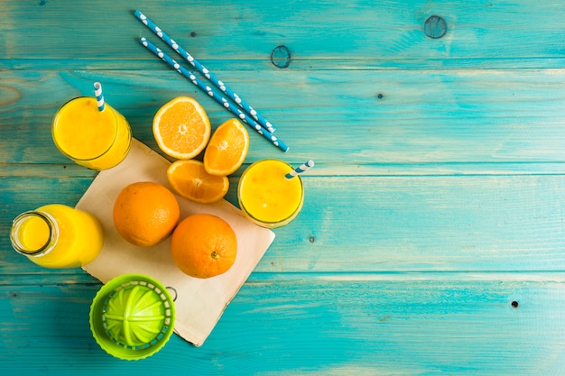 Stillleben des köstlichen orange smoothie Kostenlose Fotos
