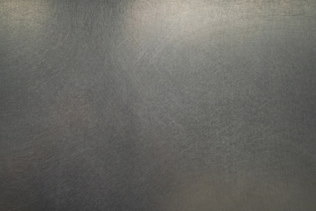 Verkratzte metallbeschaffenheit, gebürsteter stahlplattenhintergrund Premium Fotos