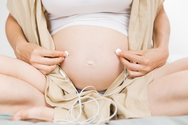 Werdende Mutter Die Ihr Baby Musik Horen Lasst Kostenlose Foto