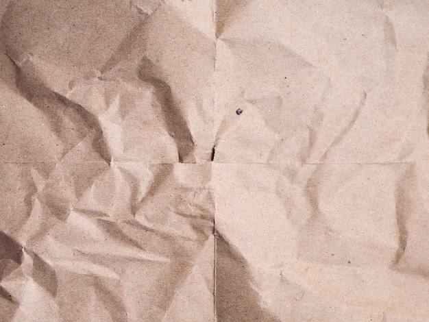 Zerknitterter papierhintergrund der nahaufnahme beige Kostenlose Fotos