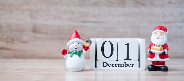 Premium Photo | 1 december calendar with christmas decoration, snowman ...