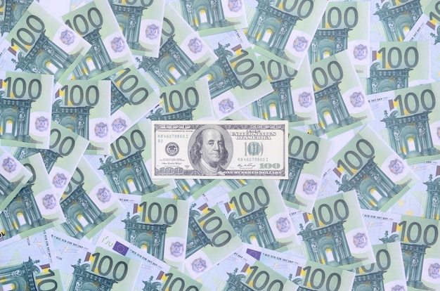 Premium Photo 100 Dollars Bill Is Lies On A Set Of Green Monetary Denominations Of 100 Euros