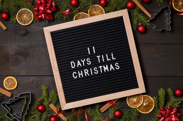 11 days till christmas countdown letter board on wood background Photo ...