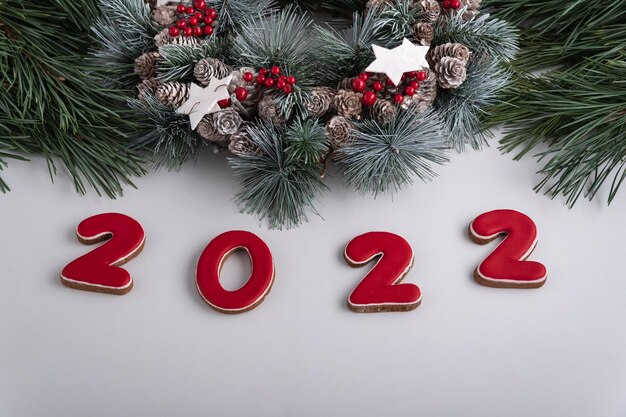 2022 The View Christmas Premium Photo | 2022 Inscription And Christmas Wreath, Top View. White  Background. Happy New Year 2022