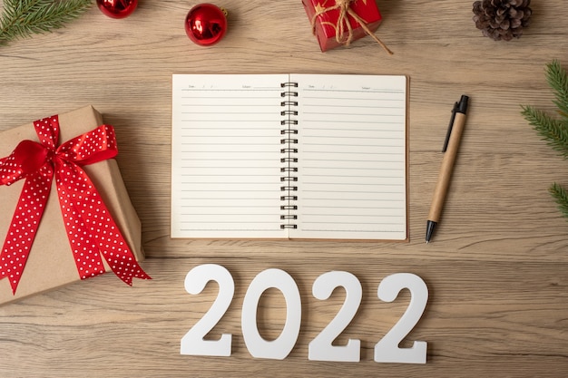 Is Christmas List Going To Be On In 2022 Premium Photo | 2022 New Year With Notebook, Christmas Gift And Pen On Wood  Table. Xmas, Happy New Year, Goals, Resolution, To Do List, Start, Strategy  And Plan Concept