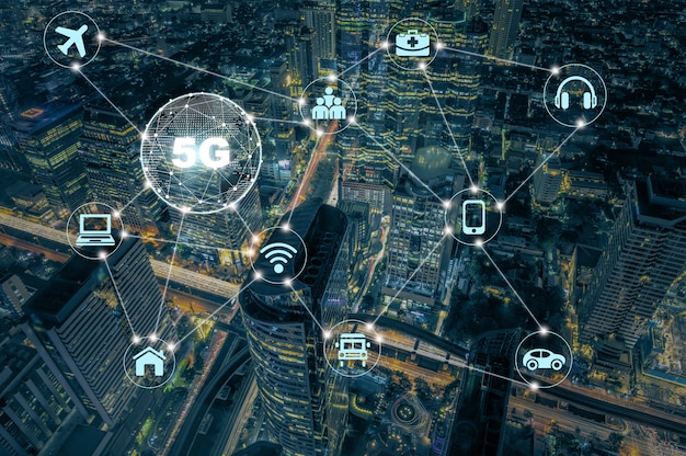 5g technology with various icon internet of thing over top view of modern building with traffic jam Premium Photo