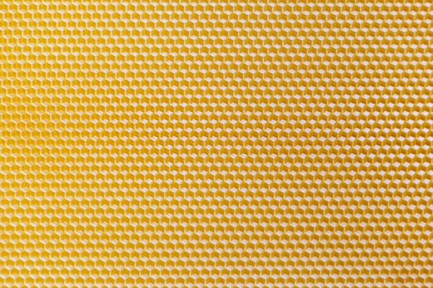 黄色のハニカムの平面図です シームレスなハニカムテクスチャ プレミアム写真