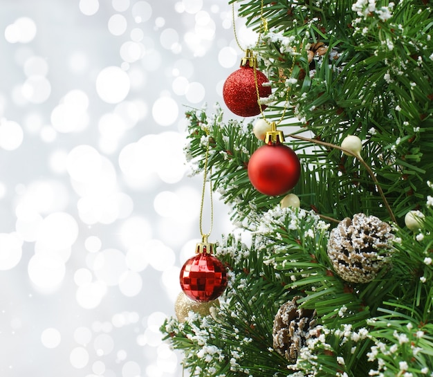 A pine tree with christmas decorations Photo | Free Download