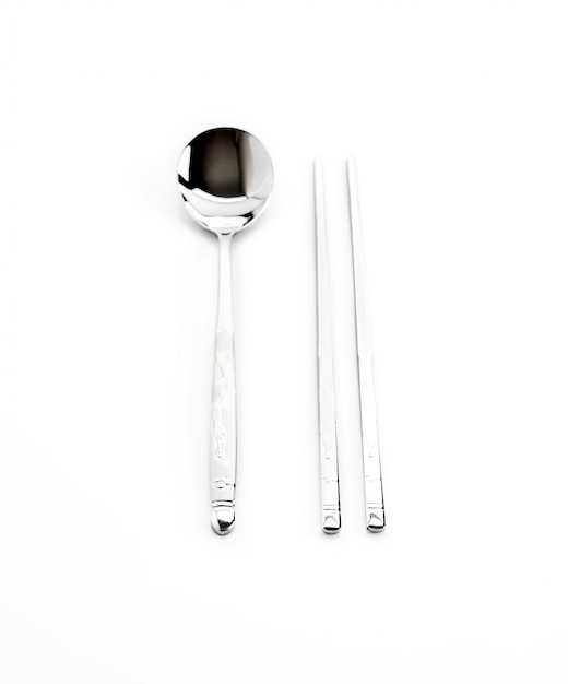 韓国の平らな金属の箸とスプーンのセット 無料の写真